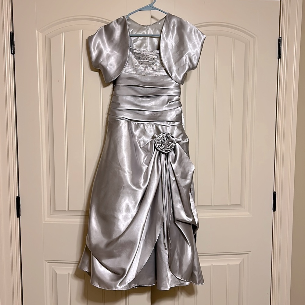 Formal dress for a young lady. Size 12. Bodice has rhinestones & silver bars